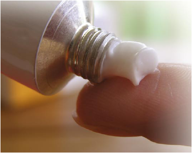Image:Cream on finger.png